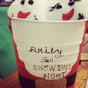Snow ball fight in a bucket